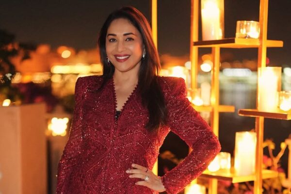 Madhuri Dixit Nene wore a red sharara set by Ritika Mirchandani embroidered with crystal bugles