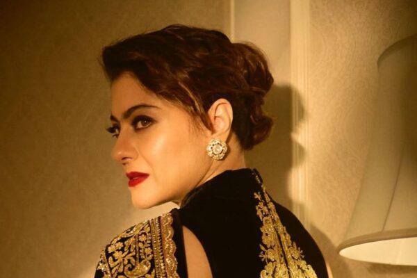 Kajol’s archival black Manish Malhotra sari features zardozi on chenille fabric