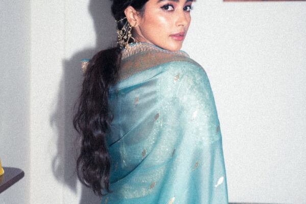 Pooja Hegde channelled vintage glamour in a blue-and-gold Banarasi sari